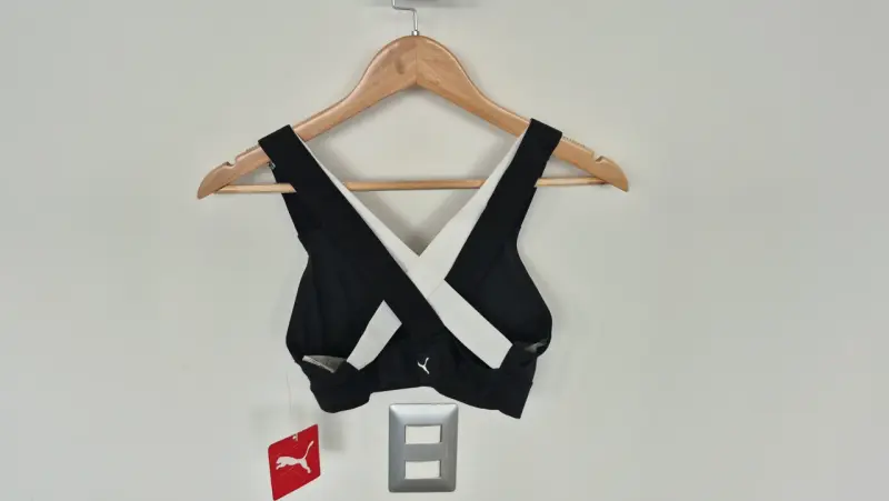 Top deportivo negro y blanco Puma - 1