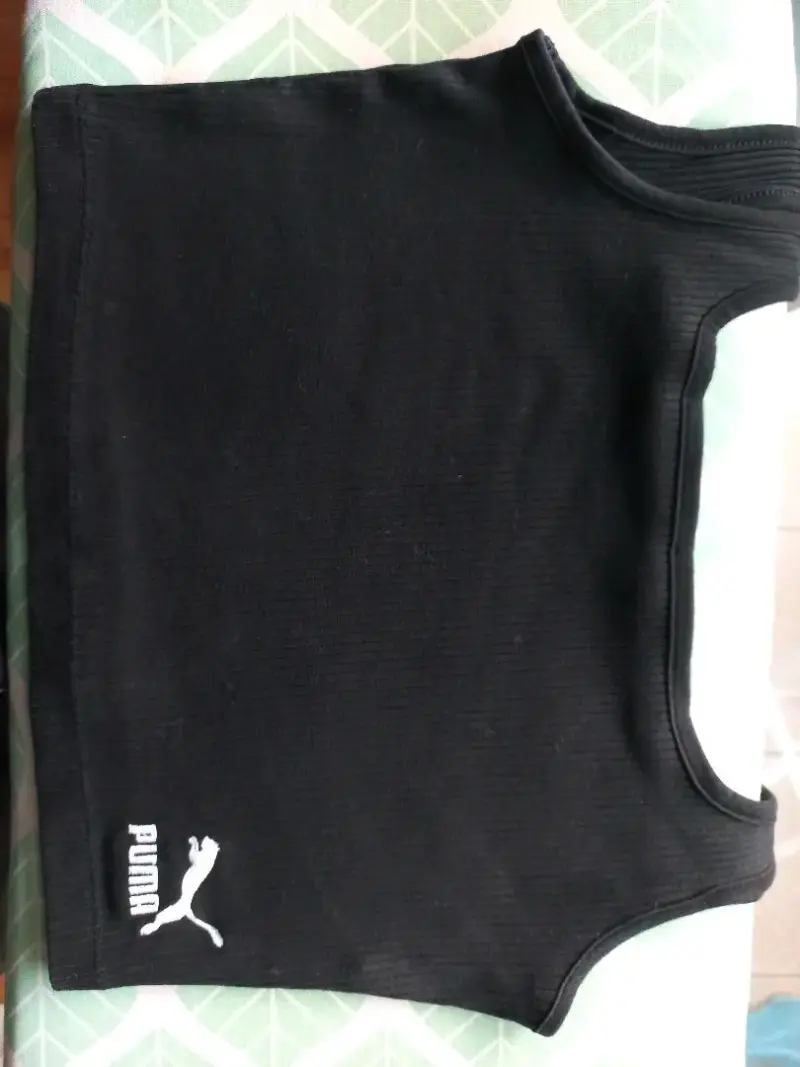 Polera sin mangas negra Puma para mujer