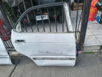 puertas Suzuki baleno 99 ambas en 30.000 - miniatura 5