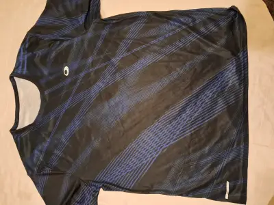 Polera deportiva azul talla XL 1 solo uso - miniatura 1
