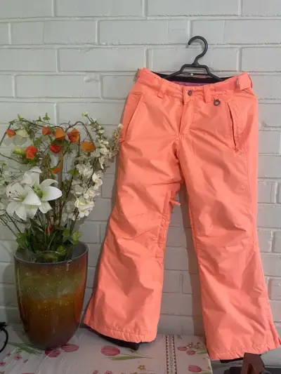 Pantalones de nieve naranjas para niña - miniatura 1