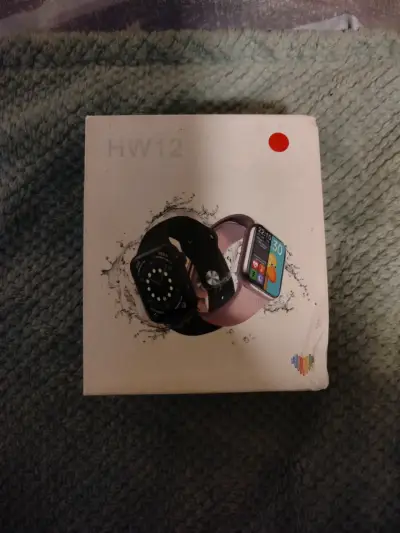 Smartwatch HW12 con correa roja y caja original - miniatura 1