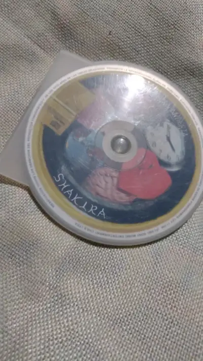 CD Servicio de Lavandería de Shakira - miniatura 2