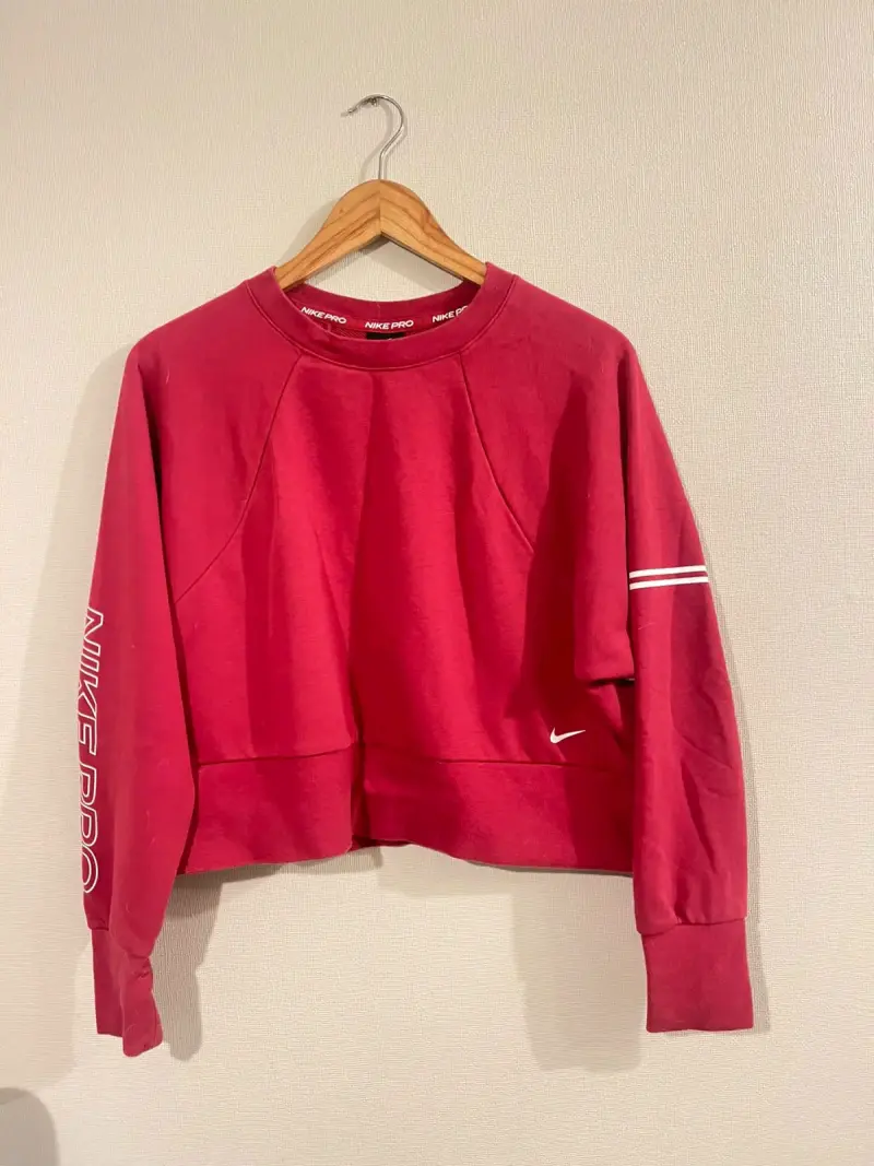 Polerón Nike Pro rojo para mujer