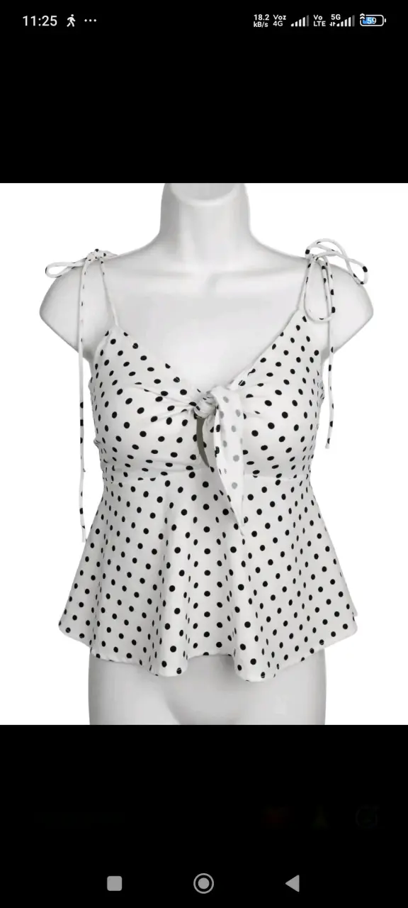 Blusa de lunares con lazo en el frente - 1