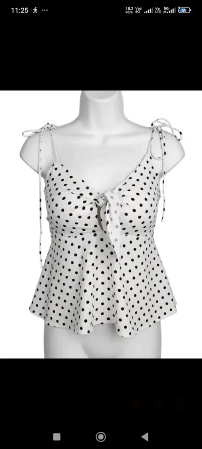 Blusa de lunares con lazo en el frente - miniatura 1