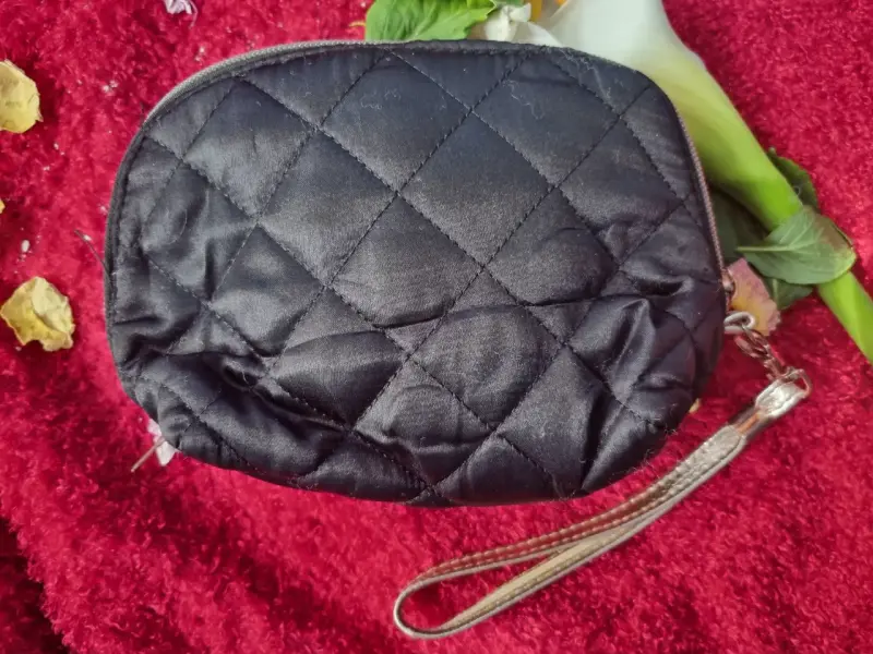 Estuche de mano Juicy Couture. - 2