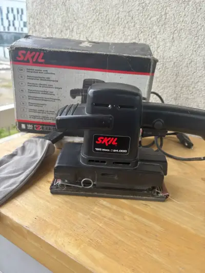 Lijadora orbital Skil 185W con bolsa recolectora - miniatura 1