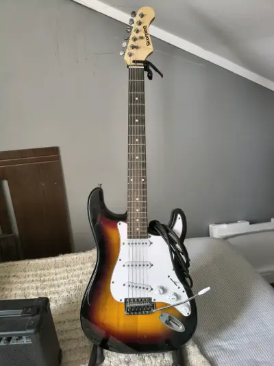 Guitarra eléctrica Scorpion con amplificador - miniatura 1