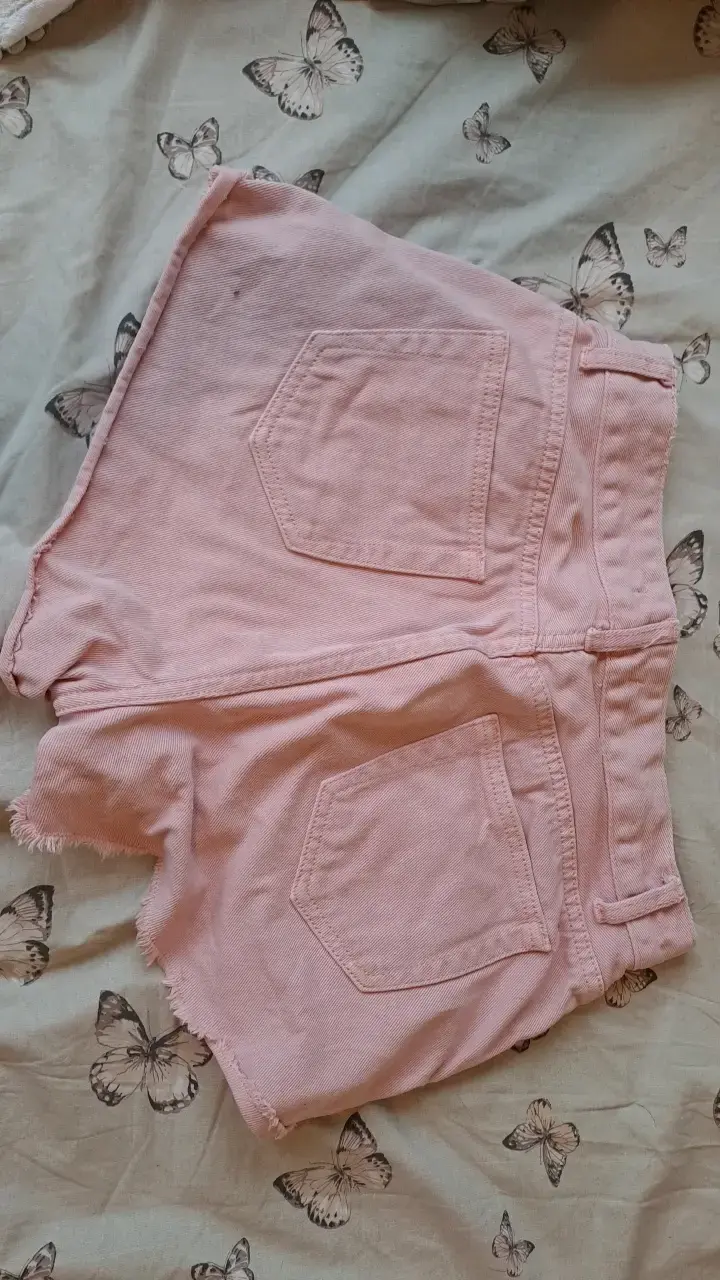 Shorts de mezclilla rosados desgastados para mujer - 2