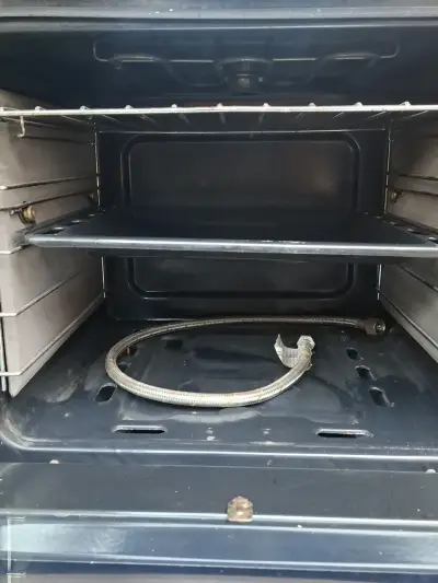 Cocina a gas de 4 quemadores con horno - miniatura 3