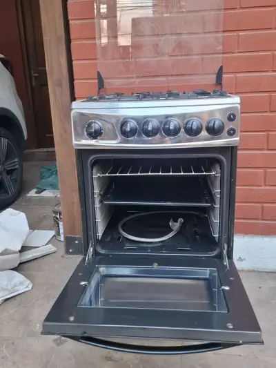 Cocina a gas de 4 quemadores con horno - miniatura 4