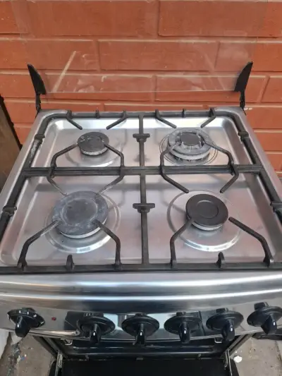 Cocina a gas de 4 quemadores con horno - miniatura 6