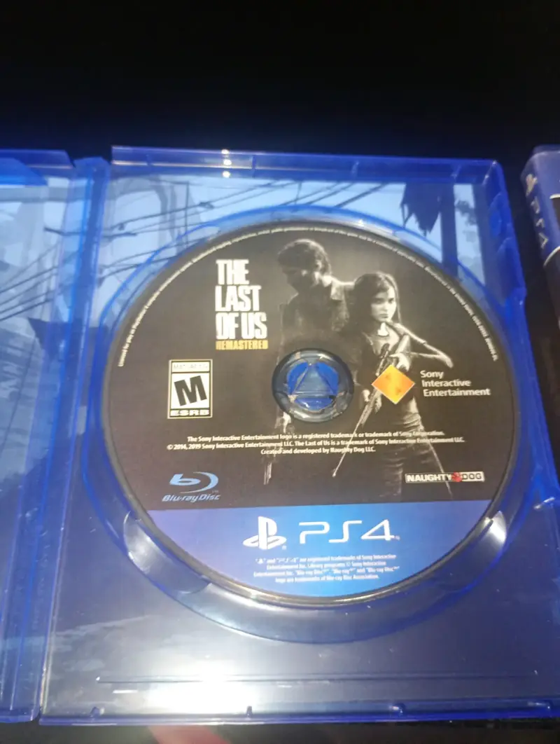 PACK de 2 juegos The Last Of Us y Mortal Kombat - 2