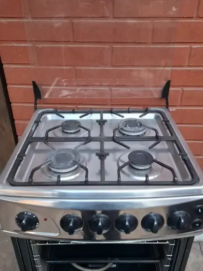 Cocina a gas de 4 quemadores con horno - miniatura 2
