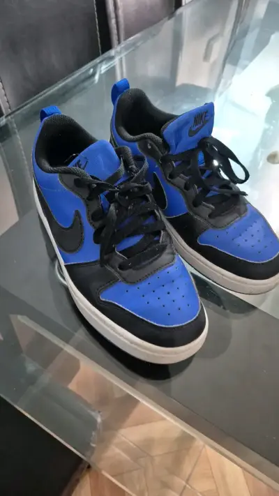 Zapatillas deportivas Nike azules y negras - miniatura 1
