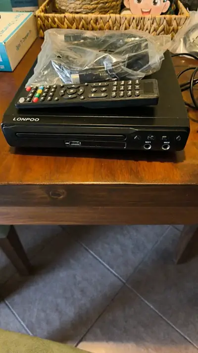 Reproductor de DVD Lonpoo con control remoto - miniatura 1