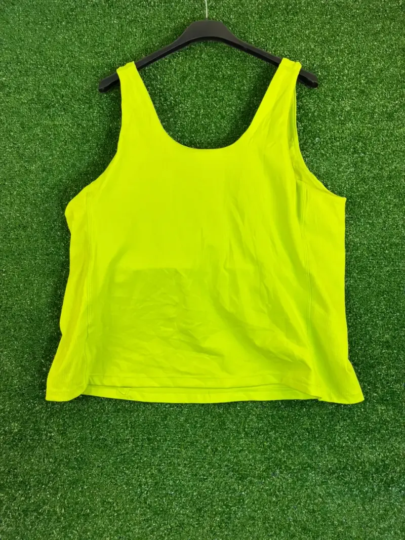 Polera deportiva sin mangas amarilla - 5