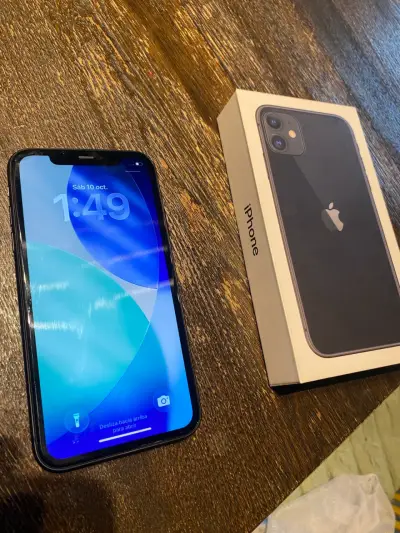iPhone 11 en buen estado con caja original batería - miniatura 1