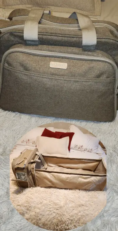 Bolso cambiador Infanti beige con múltiples compartimentos - miniatura 1