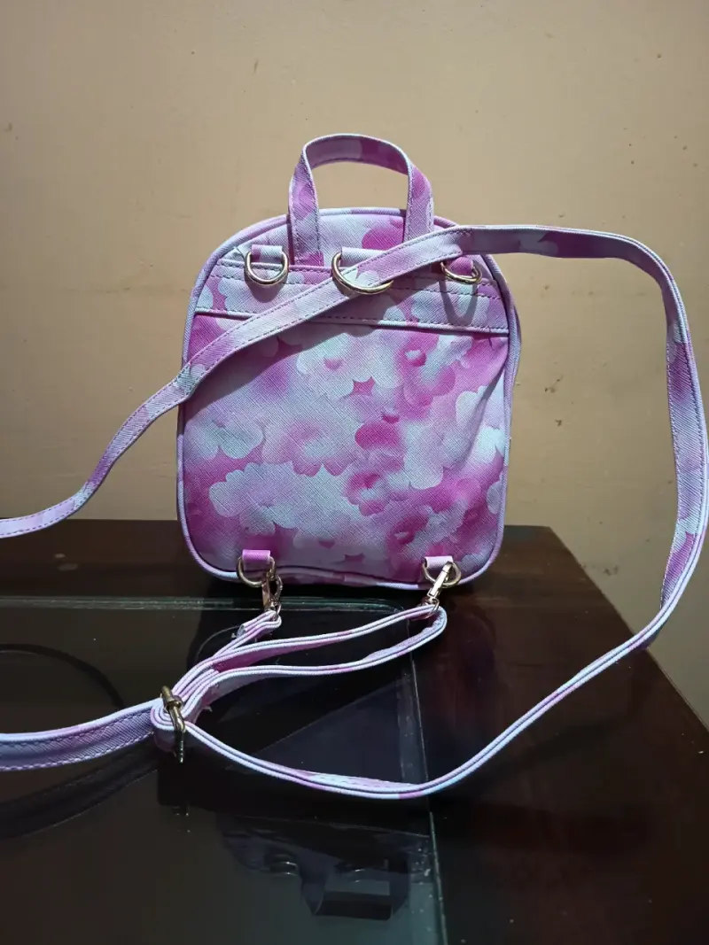 Mochila pequeña rosa con diseño floral - 4