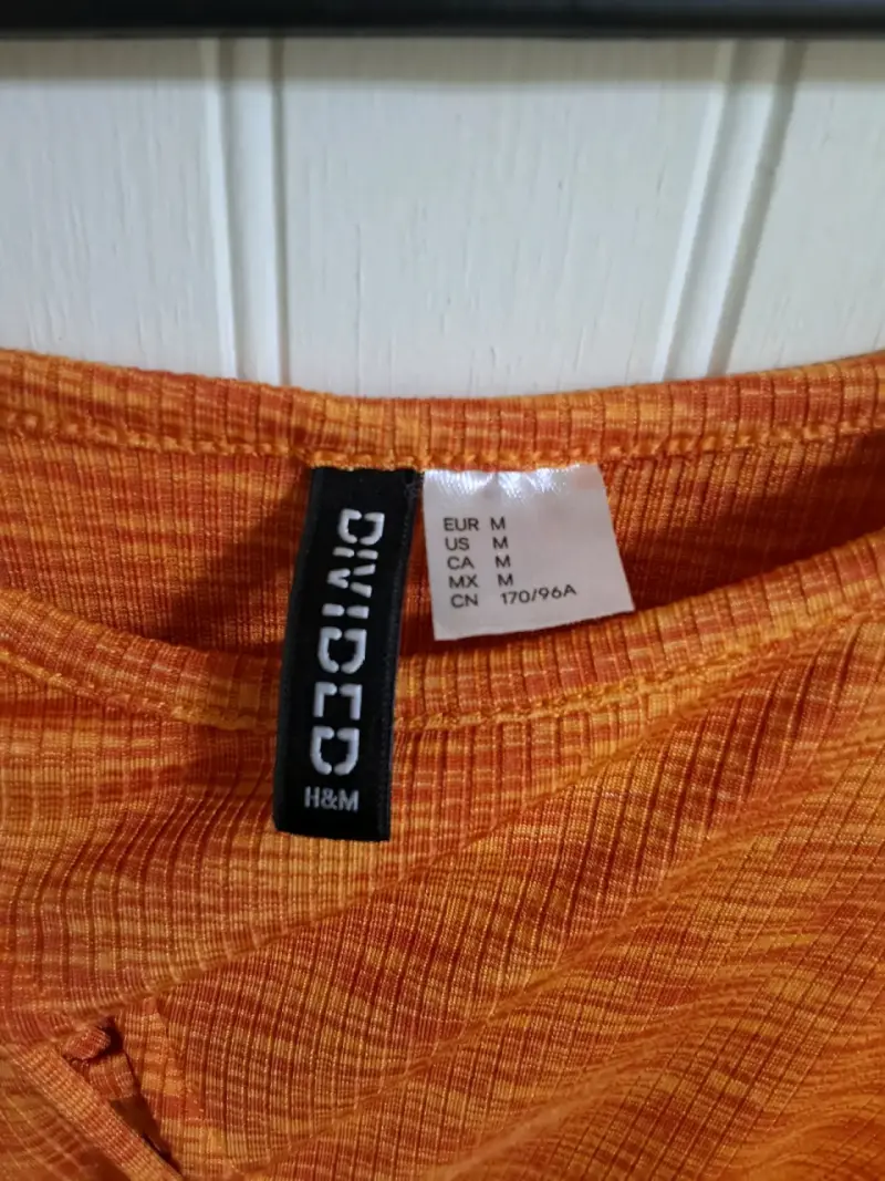 Top sin mangas naranja con diseño trenzado - 4