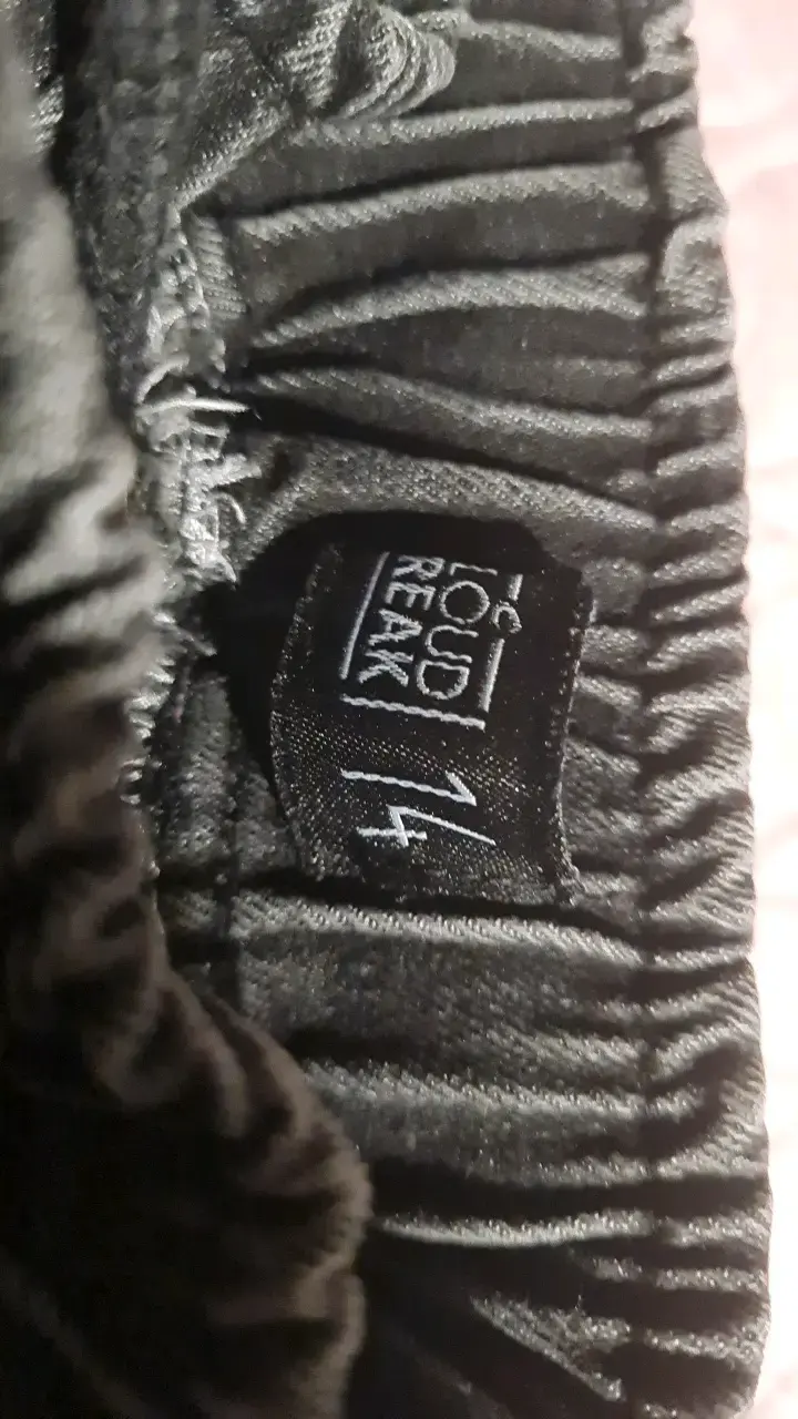 Pantalones de mezclilla negros con roturas - 2