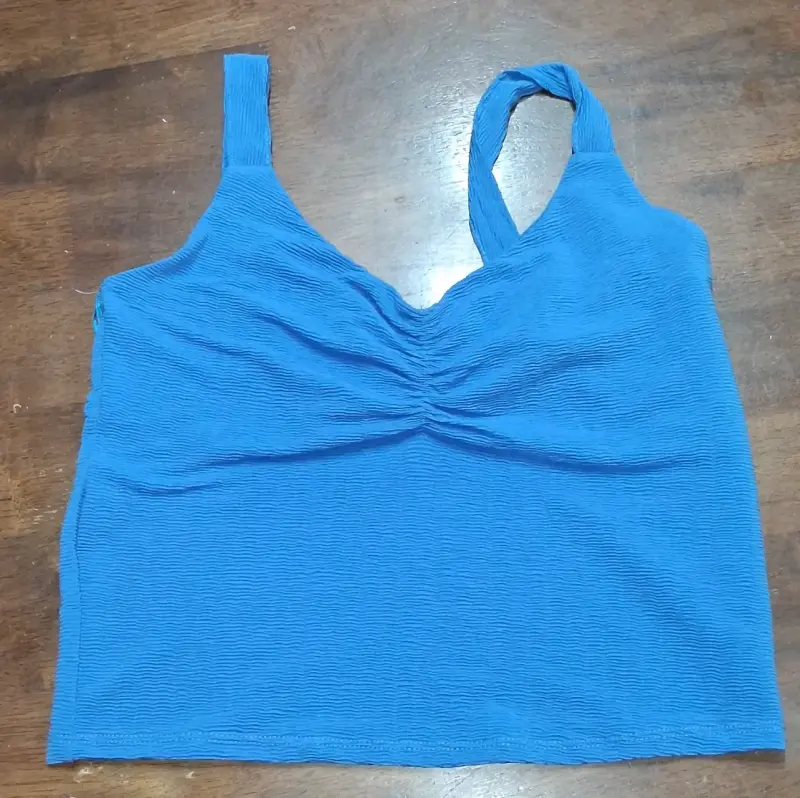 Top azul sin mangas para mujer