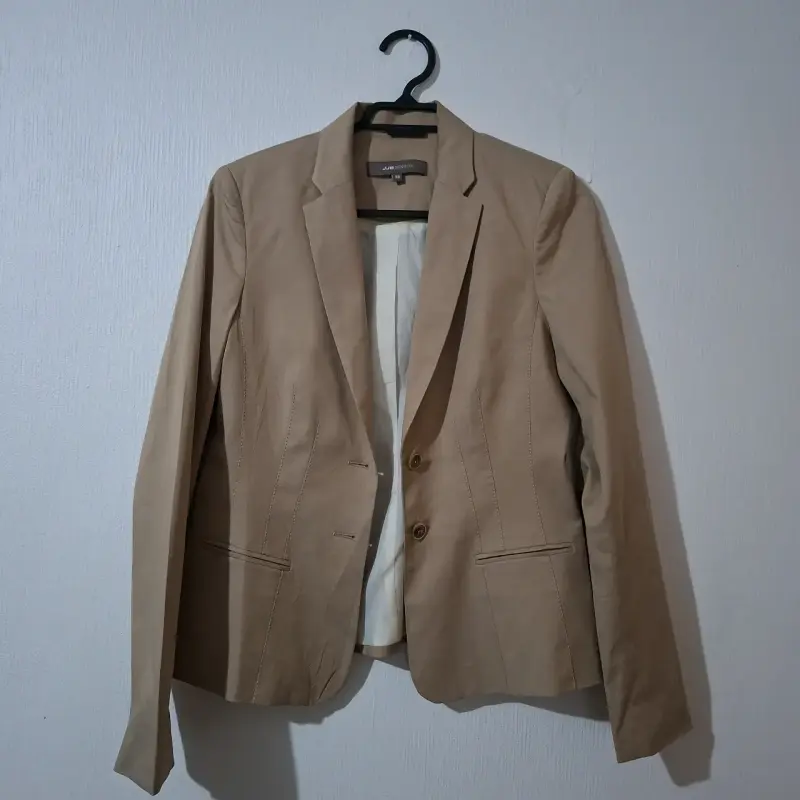 Blazer beige para mujer en buen estado