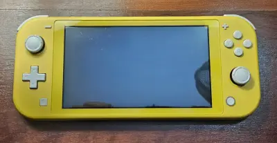 Nintendo Switch Lite amarilla - miniatura 1