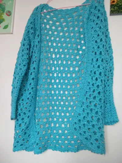 Chaleco tejido a crochet azul turquesa - miniatura 1