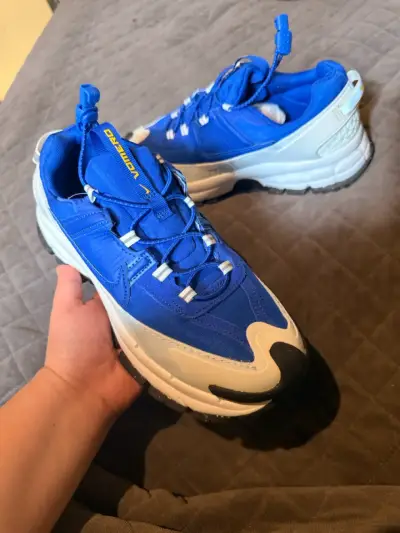 Zapatillas deportivas azules Nike Vomero - miniatura 1