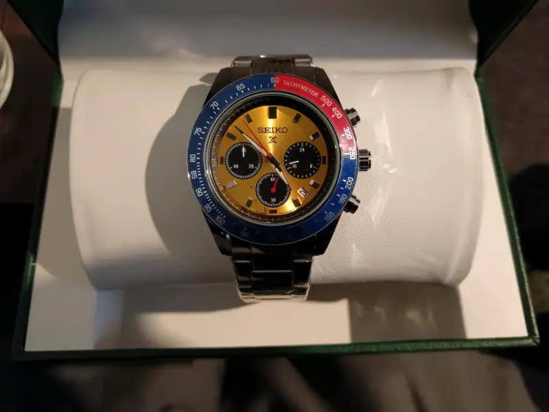 Reloj Seiko cronógrafo dorado y azul - 1