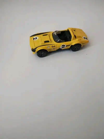 Set de autos hot wheels amarillos variados - miniatura 4