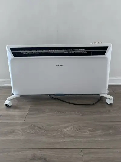 Calefactor eléctrico Toyotomi con ruedas - miniatura 1