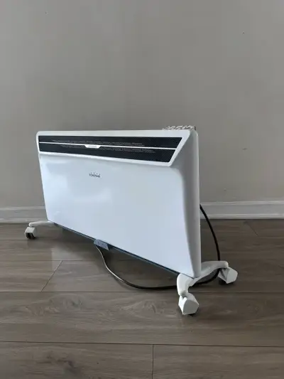 Calefactor eléctrico Toyotomi con ruedas - miniatura 2