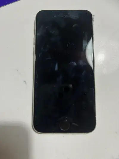 iPhone SE blanco 64 gb en buen estado con funda - miniatura 1