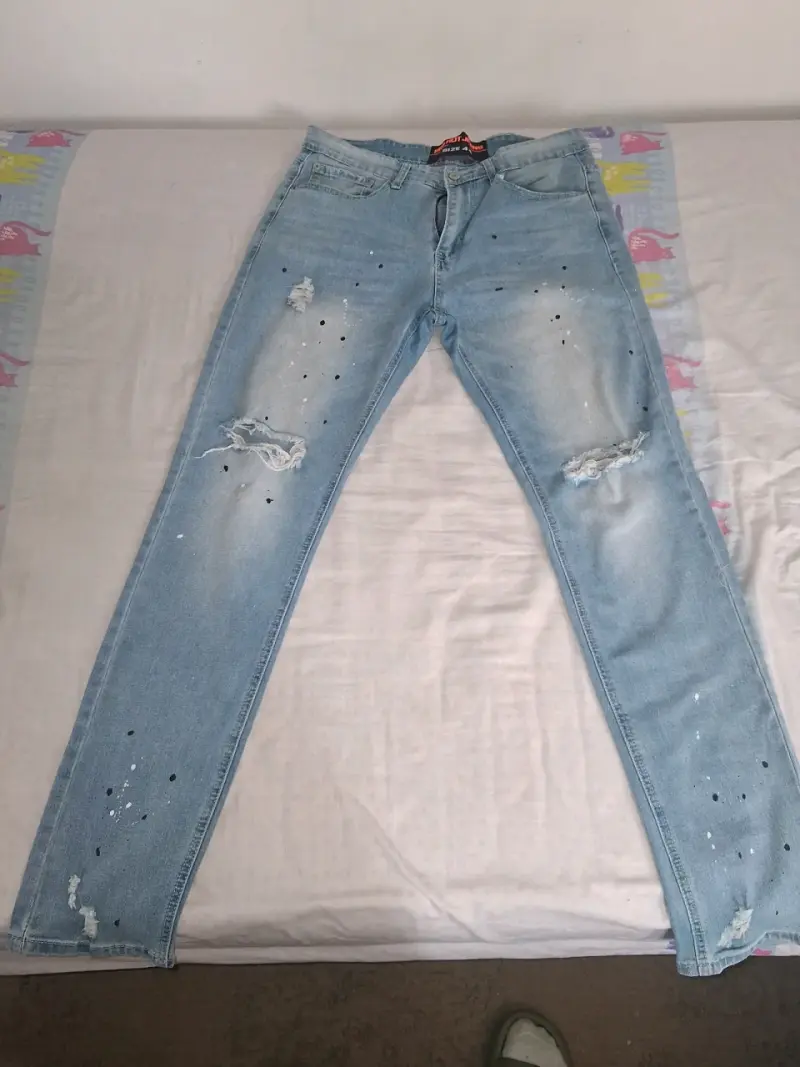 Jeans de mezclilla desgastados para hombre