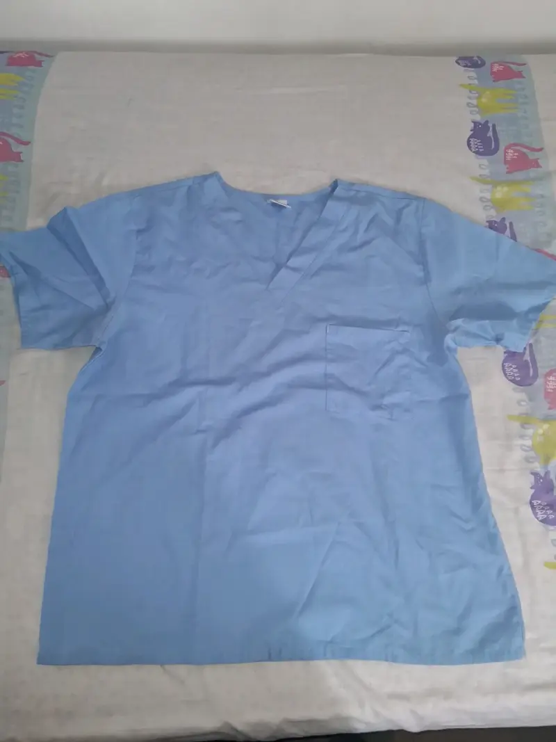 Blusa médica azul para mujer
