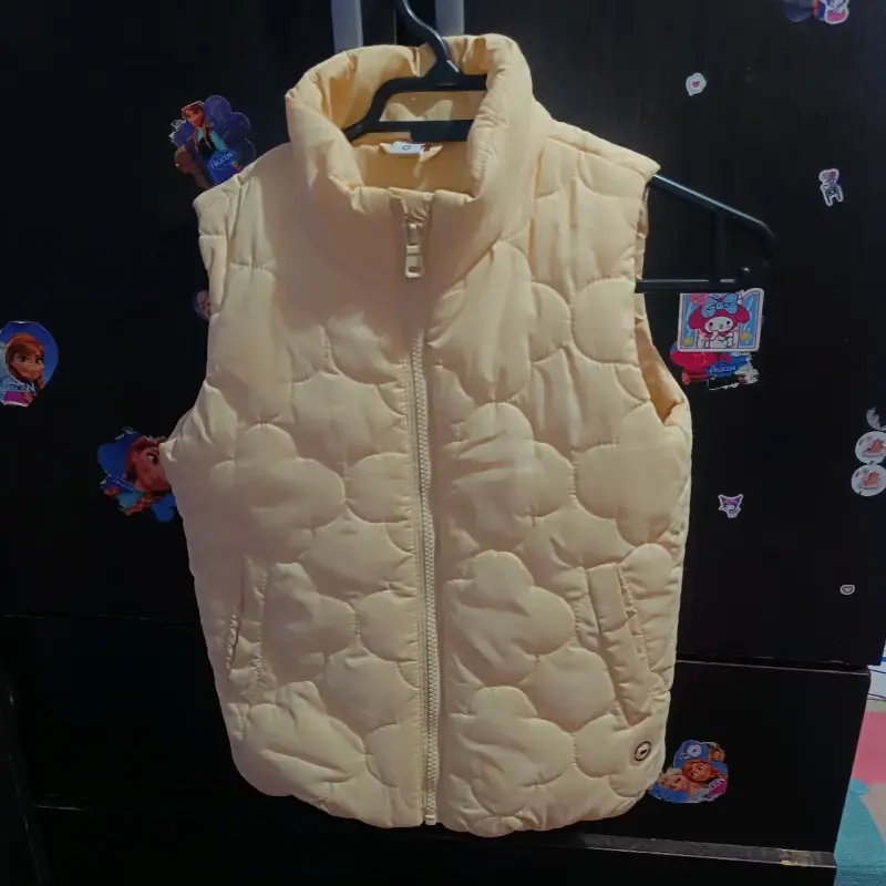 Parka acolchado beige sin mangas para niña talla 8