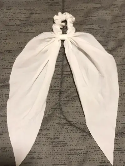 Coletero con lazo blanco elegante - miniatura 1