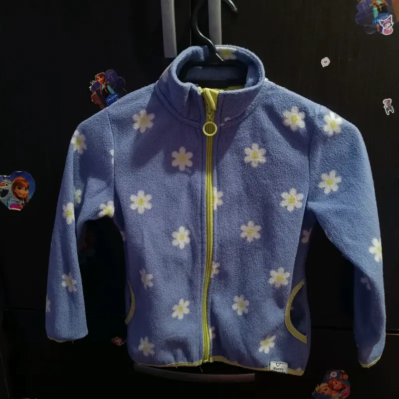 Chaqueta polar infantil azul con flores