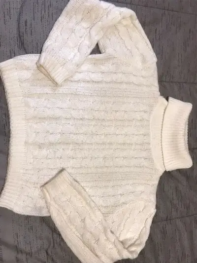 Suéter de lana blanco con cuello alto - miniatura 1