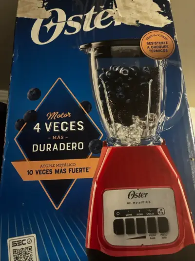 Licuadora Oster roja con vaso de vidrio - miniatura 2