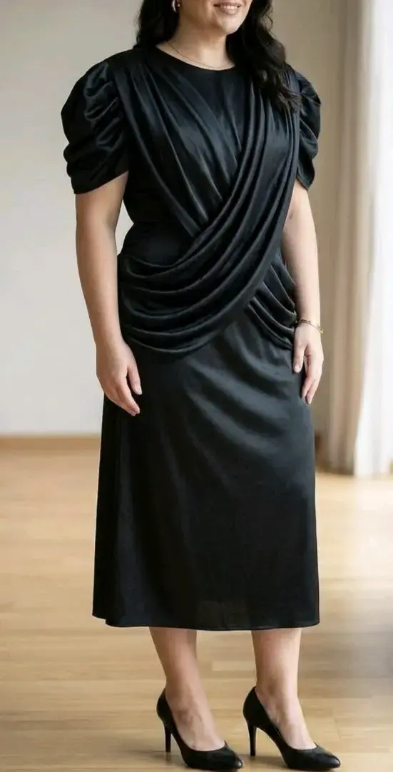 Vestido negro elegante con mangas abullonadas - 2