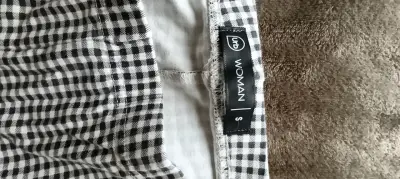 Calza a cuadros blanco y negro para mujer - miniatura 1