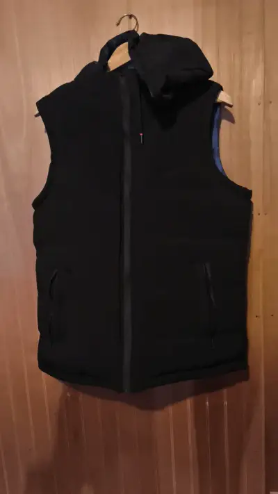 Chaleco reversible negro y azul con capucha - miniatura 1