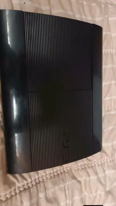 Consola PS3 con dos controles y juegos Call of Duty - miniatura 1