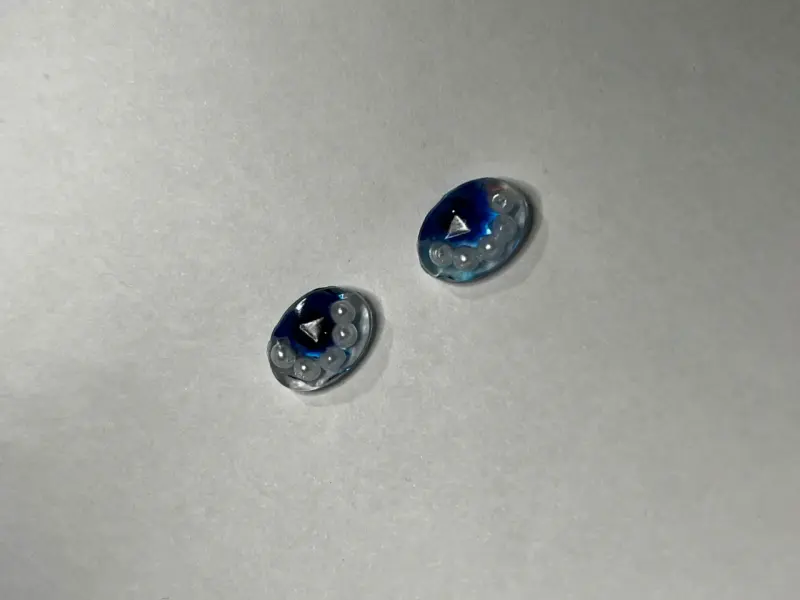 Pendientes azules con diseño de perlas