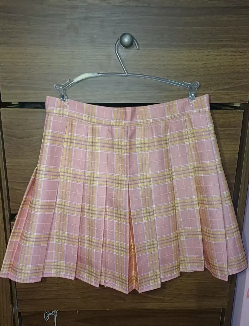 Falda corta a cuadros rosados